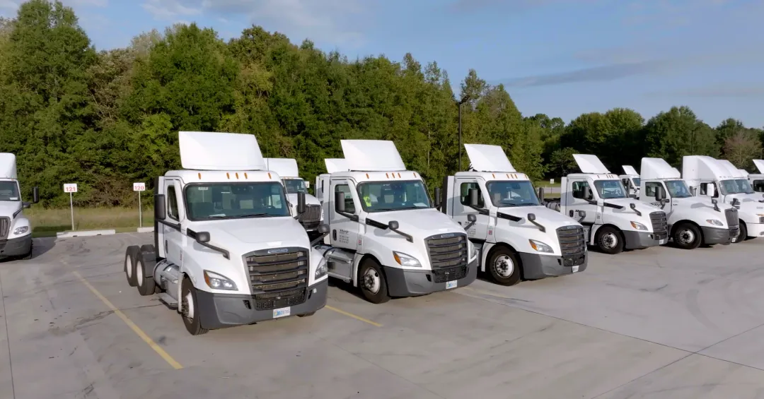Lineup of fleet of Freightliner trucks for Local Company Drivers